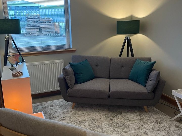 An armchair in the corner of the counselling room